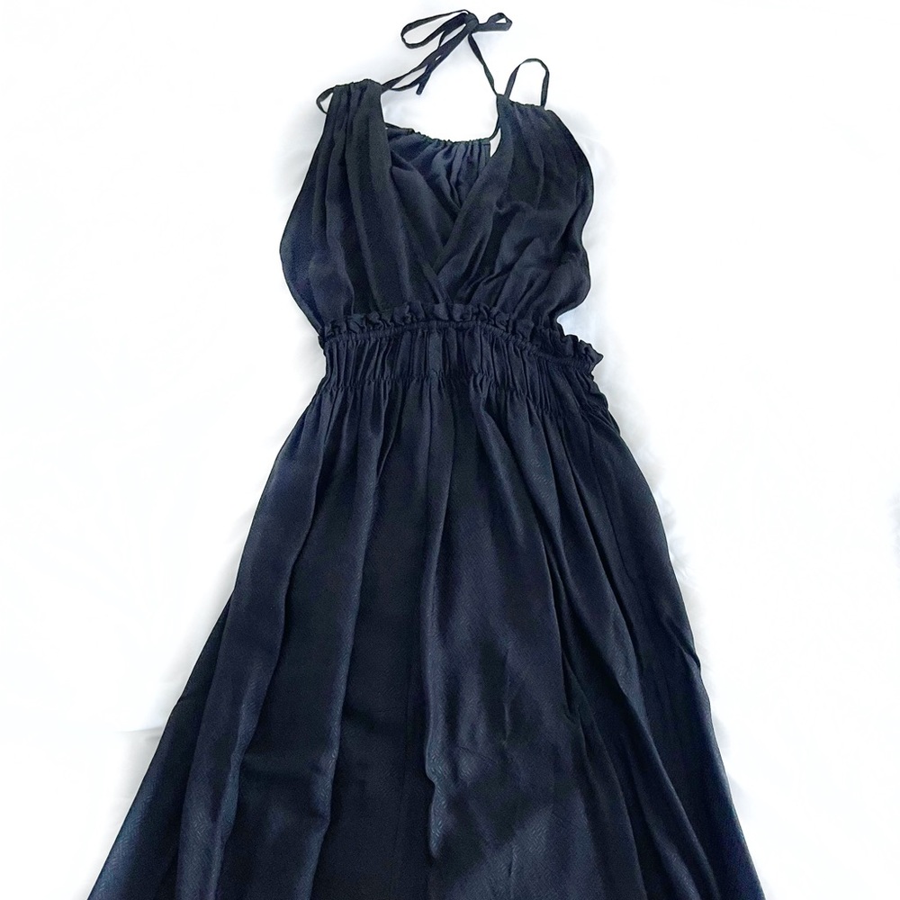 Strappy black maxi dress in a textured fabric